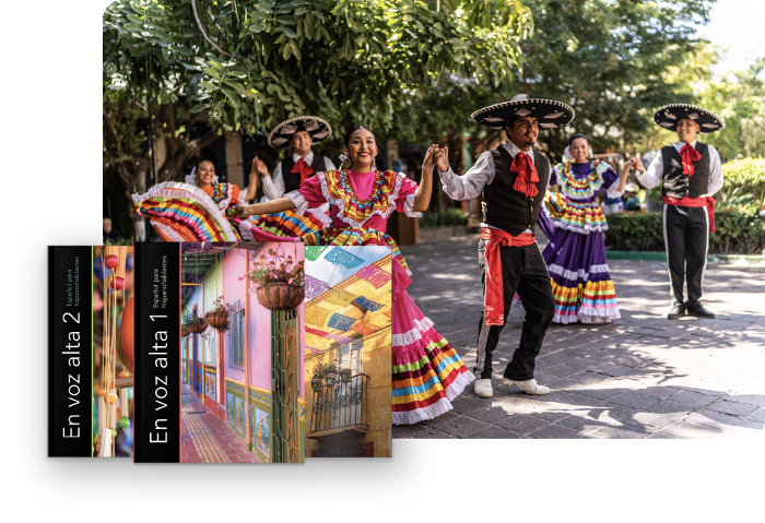 A group of dancers in traditional Mexican attire perform outside on a sunny day. In the foreground, two colorful book covers with the title *En voz alta* and ¡Qué chévere! Spanish textbook are displayed, adding a touch of vibrant literary charm to the lively scene. A group of dancers in traditional Mexican attire perform outside on a sunny day. In the foreground, two colorful book covers with the title *En voz alta* and ¡Qué chévere! Spanish textbook are displayed, adding a touch of vibrant literary charm to the lively scene.